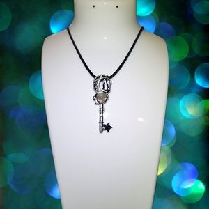 Cat Sitting on Cresent Moon Key With Moonstone